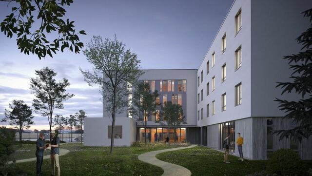 Résidence moderne opusbati à Toulouse au crépuscule avec jardin arboré et chemin béton, ambiance chaleureuse